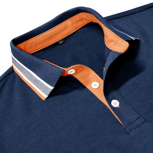Detail of navy Polo shirt showing orange collar lining, white buttons, and breathable fabric
