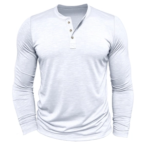 Close-up of white slub cotton Henley shirt showing three-button neckline and fabric texture