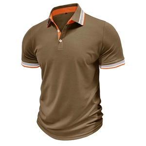 Detail of contrast stripe collar and orange inner lining on men's color-block polo shirt