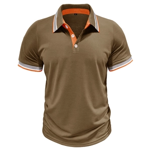 Close-up of polo shirt collar with orange contrast stripes and knit texture details