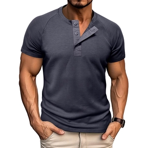 Close-up of waffle texture and three-button neckline on a men's dark grey Henley shirt