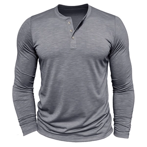Detailed close-up of the grey slub knit fabric and three-button placket on the Henley shirt
