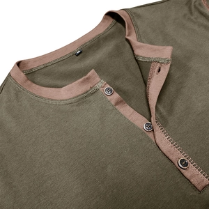 Close-up of contrast brown ribbed Henley collar and buttons on olive green knit shirt