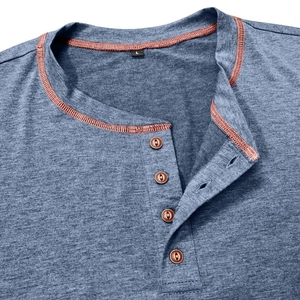 Detail of dark melange Henley shirt collar with brown buttons and contrast stitching