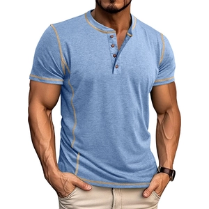 Detail of light blue Henley shirt with khaki contrast stitching and four-button placket