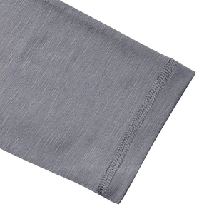 Detailed close-up of grey slub cotton fabric with double-needle stitching on the sleeve cuff