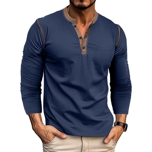 Detail of navy blue long sleeve Henley shirt with brown collar and three buttons