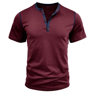 Detail of burgundy Henley shirt with navy contrast collar and three-button placket
