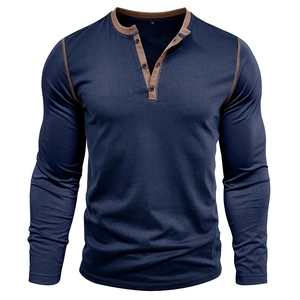Close-up of three-button Henley collar with brown contrast stitching on navy cotton knit