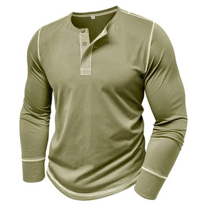 Detail of army green henley shirt showing white contrast stitching and button placket