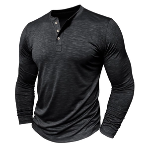 Detailed close-up of dark grey slub cotton Henley shirt with three wood buttons
