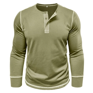Detail of olive green Henley shirt showing contrast stitching and three-button neckline