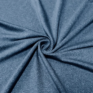 Dettaglio del tessuto a maglia blu mélange elasticizzato e ad asciugatura rapida