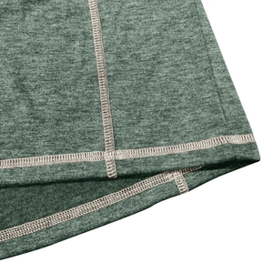 Detail of heather green fabric with durable flatlock stitching and contrast thread design