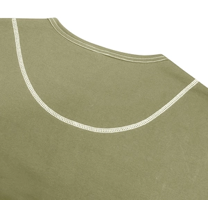 Detail of olive green crew neck tee with white double-needle stitching and knit texture