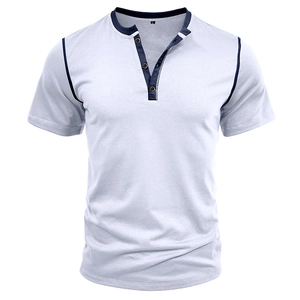 Detail of white men's short sleeve Henley shirt with navy blue contrast trim on neck