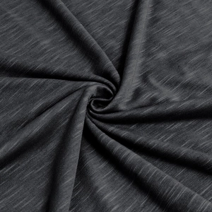 Detailed macro shot of dark grey slub cotton fabric texture for men's Henley shirt