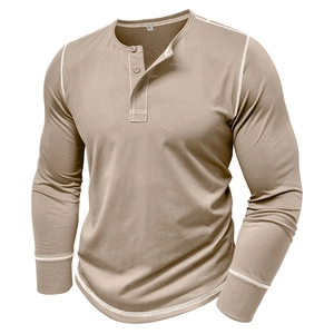 Detailed view of khaki long sleeve Henley shirt with white contrast stitching and buttons