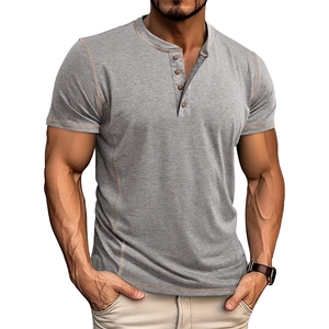 Detail of grey Henley shirt showing four-button placket and light brown contrast stitching