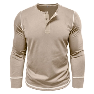 Close-up of khaki Henley shirt with white contrast stitching and button neckline details
