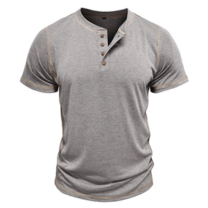 Detail of grey short sleeve Henley shirt with ginger decorative stitching and wood buttons