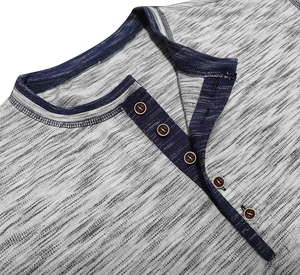 Detail of grey marl Henley neck with navy contrast trim and five brown wood-style buttons