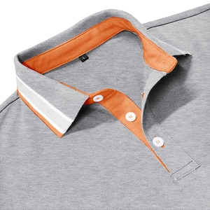 Close-up of grey short sleeve polo shirt with orange inner collar and three buttons