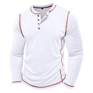 Close-up of white Henley shirt with red-brown contrast stitching and button neckline detail