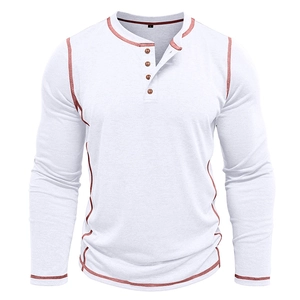 Detail of white Henley shirt featuring brown contrast stitching and four wooden buttons