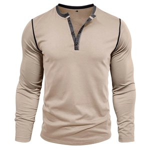 Detail view of khaki Henley shirt with black contrast collar and three-button placket