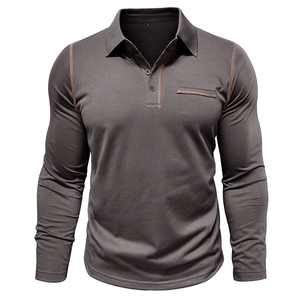 Detail of charcoal grey long sleeve polo shirt with contrast stitching and chest pocket