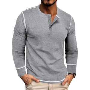 Detail of grey long sleeve Henley shirt with white contrast stitching and button neckline