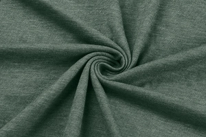 Macro view of forest green knit fabric showing soft texture and draped wave pattern