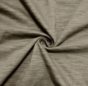 Detail view of taupe heathered knit fabric showing premium slub texture and soft fiber finish