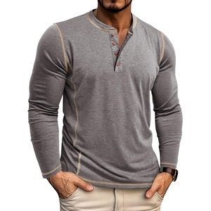 Close-up of grey long sleeve Henley shirt featuring three-button placket and contrast stitching