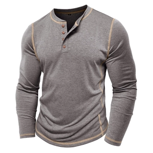 Detail of grey Henley shirt with yellow contrast stitching and three-button neckline