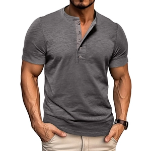 Detail of grey short sleeve Henley shirt with five-button placket and textured fabric