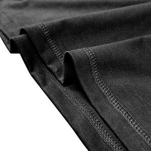 Detail of premium black knit fabric showing precise stitching and soft texture