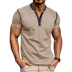 Detail of short sleeve Henley shirt with contrast three-button placket and black stitching