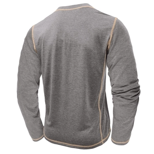 Detail of dark gray Henley shirt with contrast yellow stitching and cotton texture