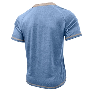Rear view of men's short sleeve Henley shirt featuring raglan sleeves and contrast trim