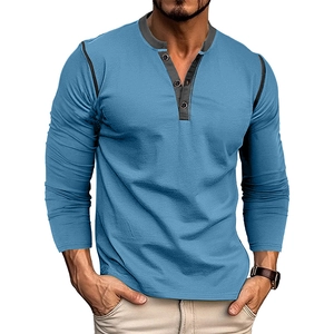 Detail shot of the blue and grey contrasting neckline with three buttons on the Henley shirt