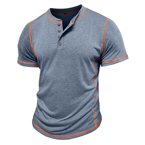 Detail view of heather blue Henley shirt with orange contrast stitching and buttons