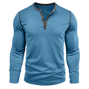 Detail of blue Henley shirt with gray contrast neckline and three-button placket