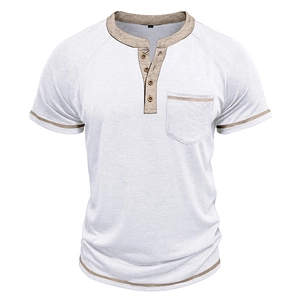 Detail of white Henley shirt featuring tan contrast edges and dark wood-textured buttons