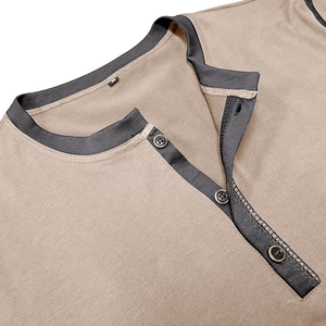 Detail of khaki men's Henley T-shirt featuring contrast trim and three-button placket