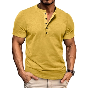 Detail of yellow muscle henley shirt showing slub cotton texture and five-button neckline