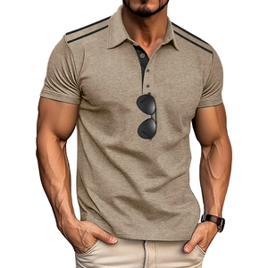 Detail of khaki polo shirt featuring contrast shoulder stripes and dark button placket