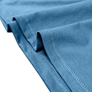 Detailed close-up of sky blue henley shirt featuring high-quality double-needle stitching