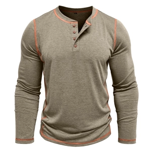 Detail of four-button Henley neckline with orange contrast stitching on long sleeve shirt